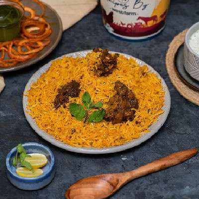 Dum Mutton Lucknowi Biryani 500gm  With Raita +2Pcs Lahori Seekh + 2Pcs Malai Seekh