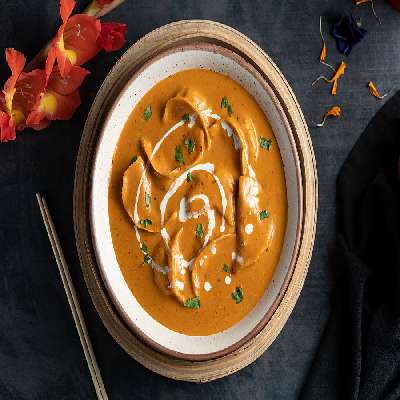 Chicken Momo Mixed With Makhani Sauce