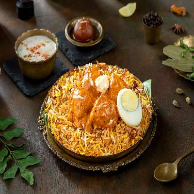 Makhan Murgh (Butter Chicken Boneless Hyderabadi Biryani-Serve-1)