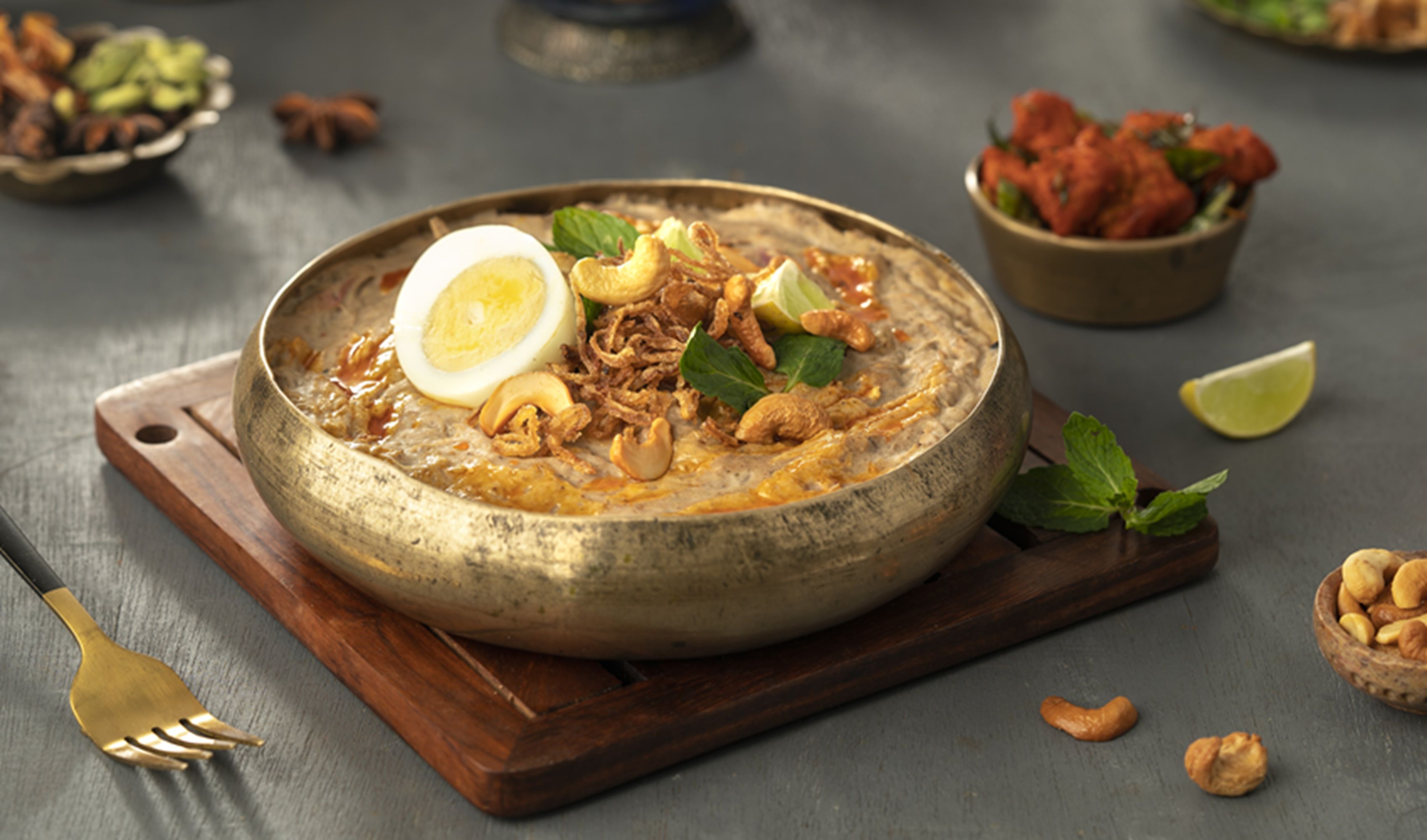 Mutton Haleem With Chicken 65 And Egg Topping
