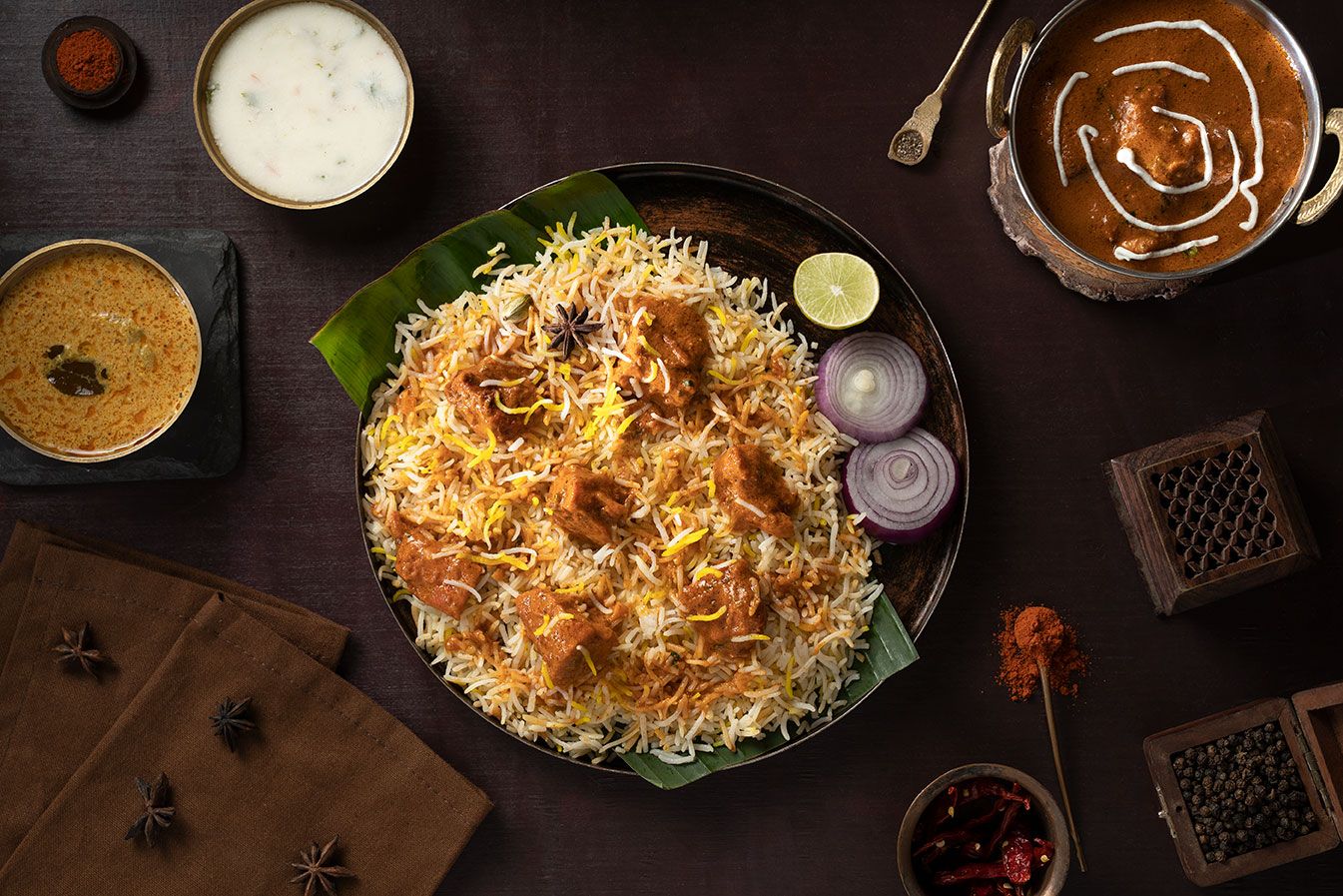 Makhan Murgh (Butter Chicken Boneless Hyderabadi Biryani -Serve -2)