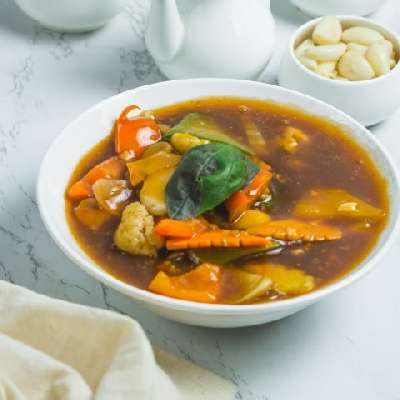 Schezwan Mixed Vegetables With Baby Corn And Button Mushroom
