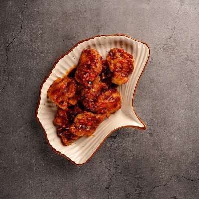 Sliced Fish In Chilli Soya (Beckti) (10 Pcs)