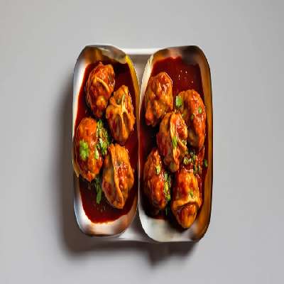 Pan Tossed Paneer Momo In Chilli Sauce [8 Pieces]
