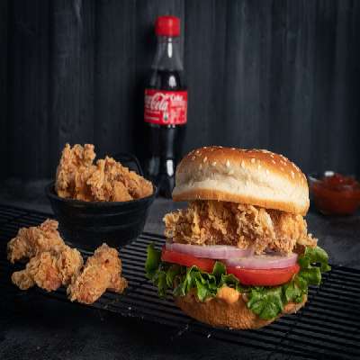 Chicken Snacker Burger Burger + 1 Coke (250 Ml) + Popcorn (10 Pcs)