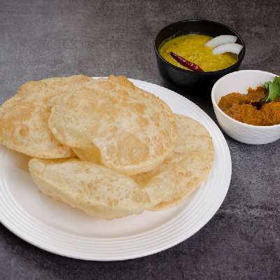 Luchi With Aloo Dum And Cholar Dal