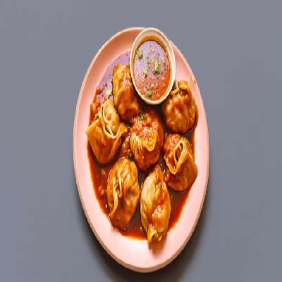 Pan Tossed Mixed-Veg Momo In Manchurian Sauce [8 Pieces]