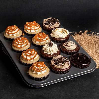 Six Chocolate Cupcakes With Six Butterscotch Cupcakes