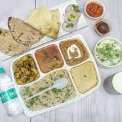 Sahi Paneer + Chole Masala + Dal Fry + Rice + 2 Lachha Paratha + Raita + Papad + Achar + Salad + Gul