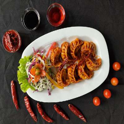 Schezwan Sauce Mix Veg Momos
