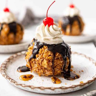 Fried Ice Cream With Nuts And Caramel Sauce
