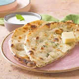 Paneer Parantha With Curd.