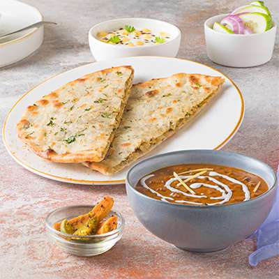 Aloo Kulcha With Dal And Raita