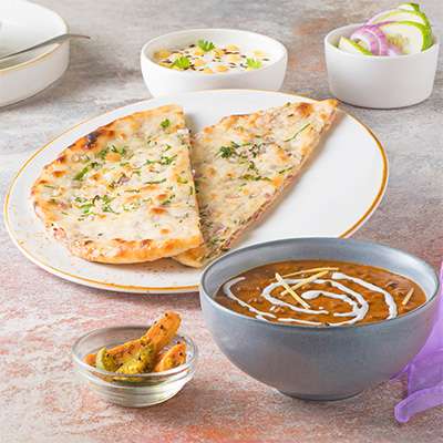 Onion Kulcha With Dal And Raita
