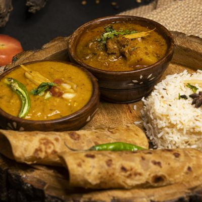 Yellow Dal Tadka, Shudh Special Aalu Wadia, 6 Paranthas, Jeera Rice, Homemade Pickle, Desi Ghee Halw