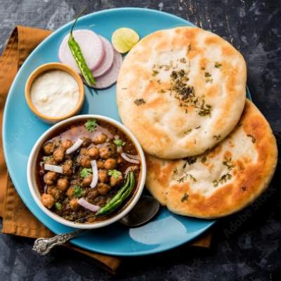 Butter Maska Kulcha With Chatpate Cholley And Green Chutney