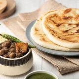 Baked Kulcha  with Chole 2 Pcs (Serves 1)