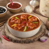 Fish In Schezwan Sauce Gravy