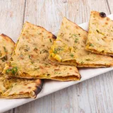 Onion Paratha With Masala Dahi