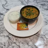 Dal Khichdi 300ml  With Achar And (Dahi Raita 100ml)