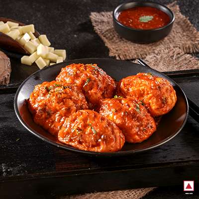 Chicken Cheese Pan Fried Momo in Tomato Garlic Sauce(Non Spicy)