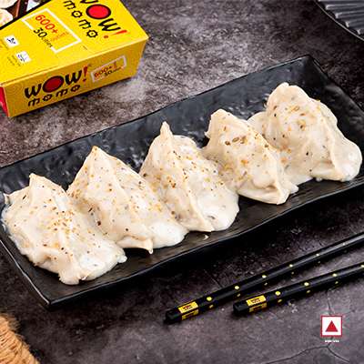 Chicken Himalayan Momo in Molten Cheesy sauce