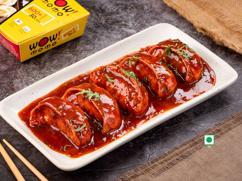 Veg Himalayan Pan Fried Momo in Schezwan Sauce (Spicy)