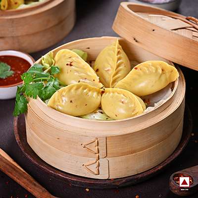 CHICKEN PAHARI FEAST STEAM MOMO