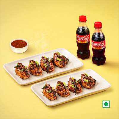 8 PC HIMALAYAN CHILLI MOMO (VEG) + 2 COKE (250ML)