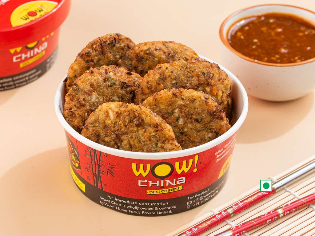 VEG CRISPY MANCHURIAN COINS WITH SCHEZWAN SAUCE (6PCS).