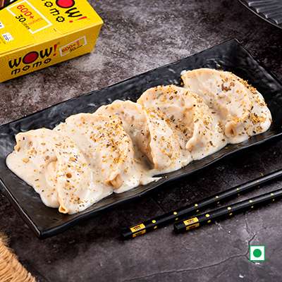 Veg Hot Garlic Momo in Molten Cheesy sauce
