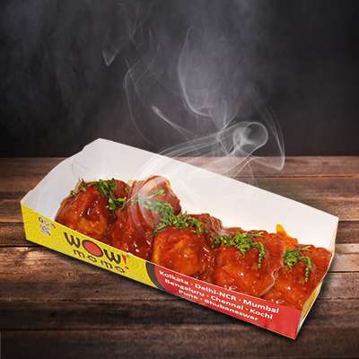 CHICKEN MASALA PAN FRIED MOMO IN TOMATO GARLIC SAUCE