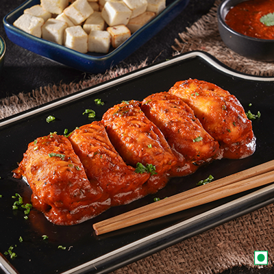 Chatpata Paneer Pan Fried Momo in Schezwan Sauce (Spicy)