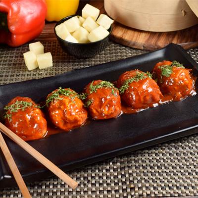 Chicken Cheese Pan Fried Momo in Tomato Garlic Sauce