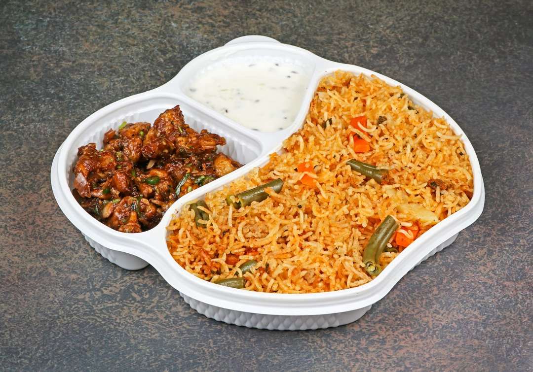 Veg biryani, Gobi Manchurian, Raita combo