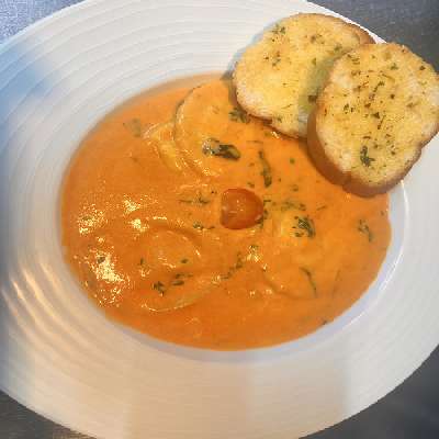 Three Cheese Ravioli In Basil Cream Sauce