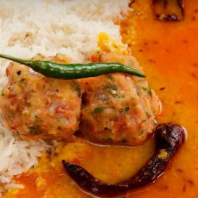Dal Pakora rice(Served with chutney, onions , fryums)