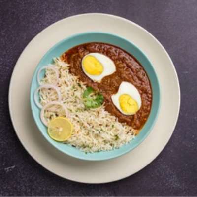 Egg curry(1 piece)+ rice(Served with chutney, onions , fryums)