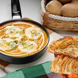 Dum Aloo Banarsi With Choice Of Bread