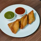Punjabi Kela Nae Samosa ( Jain )