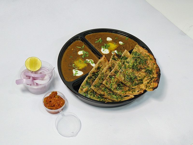 Hariyali Paratha 2 Pcs, Dal Makhni, Salad, Achar