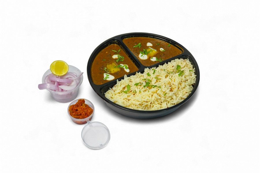 Dal Makhani- Jeera / Steam Rice( Any One) Onion Salad, Achar