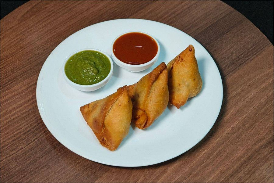 Punjabi Kela Nae Samosa ( Jain )