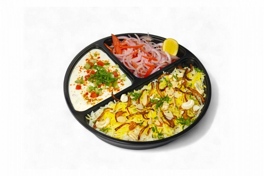 Veg Dum Biriyani Served With Raita, Onion
