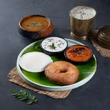 Idli Vada Served With Sambhar & Chuttnies.