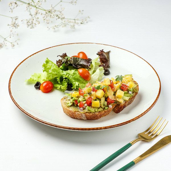 Avocado On Toast Topped With Sweet Chilli Pineapple Salsa