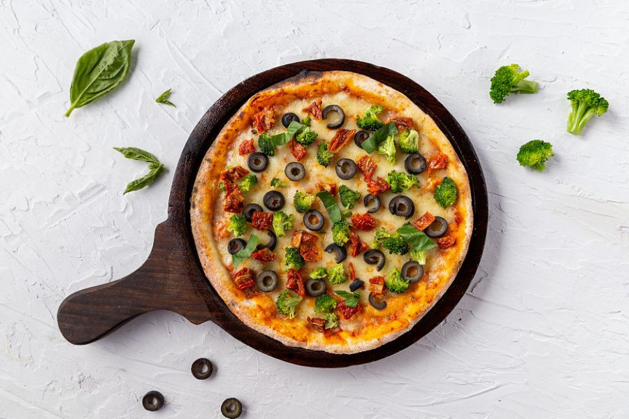 Brocolli, Olives & Sundried Tomato Pizza 9