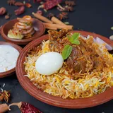 Kolkata Mutton Biryani (1pc Mutton + 1 Aloo + 1 Egg)