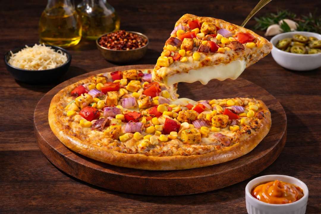Achaari Paneer Twist Cheese Burst Pizza