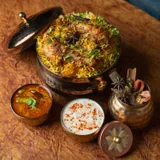 Golden Saffron Chicken Dum Biryani - Royal Dawat